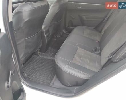 Белый Тойота Королла, объемом двигателя 1.3 л и пробегом 150 тыс. км за 10500 $, фото 22 на Automoto.ua