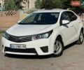 Белый Тойота Королла, объемом двигателя 1.33 л и пробегом 220 тыс. км за 6950 $, фото 1 на Automoto.ua