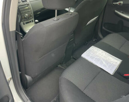 Білий Тойота Королла, об'ємом двигуна 1.6 л та пробігом 141 тис. км за 9800 $, фото 10 на Automoto.ua