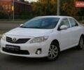 Белый Тойота Королла, объемом двигателя 1.33 л и пробегом 157 тыс. км за 7800 $, фото 1 на Automoto.ua