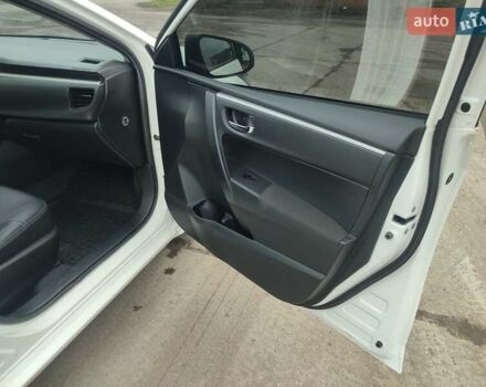 Белый Тойота Королла, объемом двигателя 1.3 л и пробегом 150 тыс. км за 10500 $, фото 32 на Automoto.ua