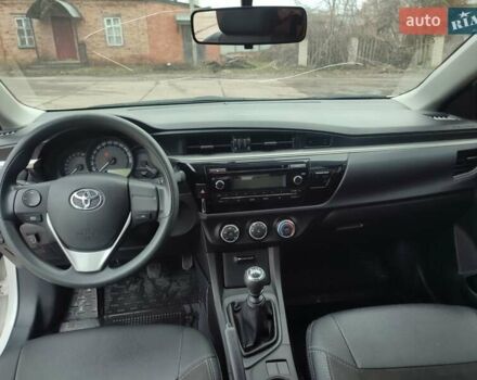Белый Тойота Королла, объемом двигателя 1.3 л и пробегом 150 тыс. км за 10500 $, фото 41 на Automoto.ua