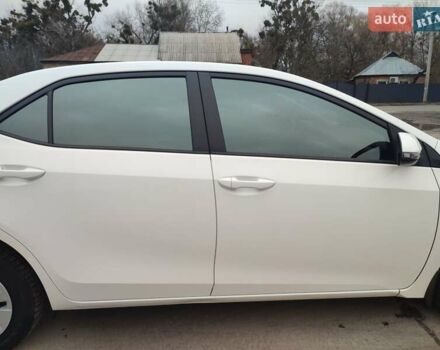 Белый Тойота Королла, объемом двигателя 1.3 л и пробегом 150 тыс. км за 10500 $, фото 11 на Automoto.ua