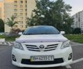 Білий Тойота Королла, об'ємом двигуна 1.4 л та пробігом 130 тис. км за 9201 $, фото 1 на Automoto.ua