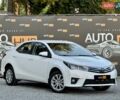 Білий Тойота Королла, об'ємом двигуна 1.6 л та пробігом 142 тис. км за 12900 $, фото 1 на Automoto.ua