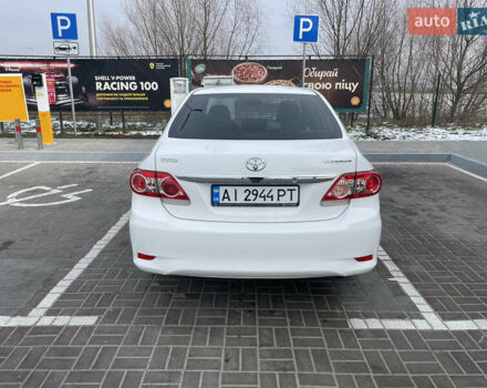 Білий Тойота Королла, об'ємом двигуна 1.6 л та пробігом 141 тис. км за 9800 $, фото 3 на Automoto.ua