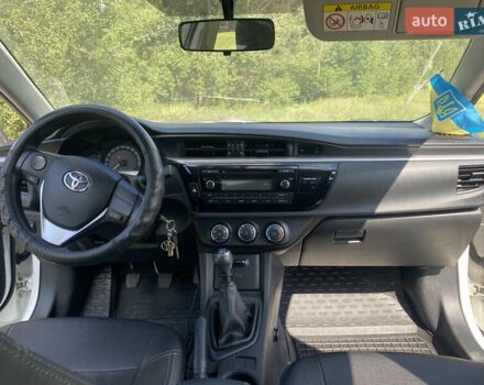 Білий Тойота Королла, об'ємом двигуна 1.33 л та пробігом 149 тис. км за 11300 $, фото 14 на Automoto.ua