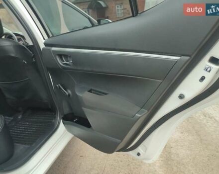 Белый Тойота Королла, объемом двигателя 1.3 л и пробегом 150 тыс. км за 10500 $, фото 29 на Automoto.ua