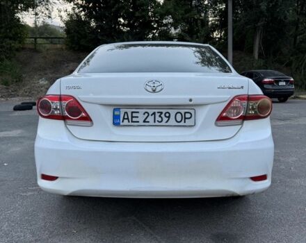 Белый Тойота Королла, объемом двигателя 1.3 л и пробегом 210 тыс. км за 8500 $, фото 1 на Automoto.ua