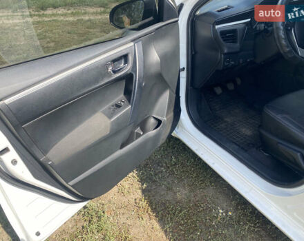 Білий Тойота Королла, об'ємом двигуна 1.33 л та пробігом 149 тис. км за 11300 $, фото 8 на Automoto.ua