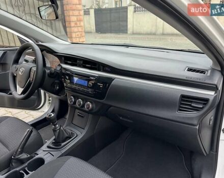 Белый Тойота Королла, объемом двигателя 1.6 л и пробегом 137 тыс. км за 10999 $, фото 58 на Automoto.ua