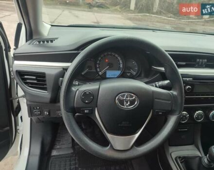 Белый Тойота Королла, объемом двигателя 1.3 л и пробегом 150 тыс. км за 10500 $, фото 43 на Automoto.ua