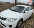 Белый Тойота Королла, объемом двигателя 1.33 л и пробегом 246 тыс. км за 9000 $, фото 1 на Automoto.ua