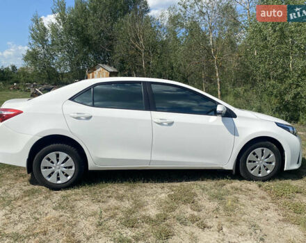 Білий Тойота Королла, об'ємом двигуна 1.33 л та пробігом 149 тис. км за 11300 $, фото 6 на Automoto.ua