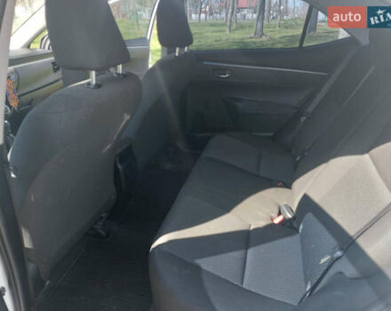 Белый Тойота Королла, объемом двигателя 1.3 л и пробегом 83 тыс. км за 12000 $, фото 10 на Automoto.ua