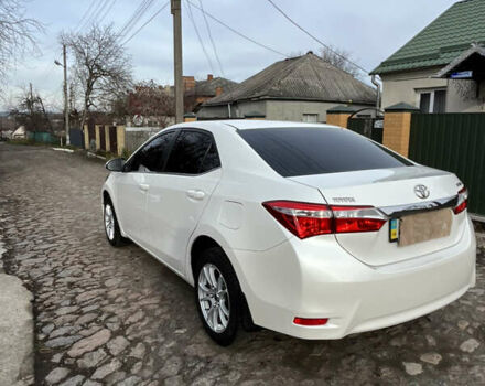 Белый Тойота Королла, объемом двигателя 1.6 л и пробегом 142 тыс. км за 12000 $, фото 4 на Automoto.ua