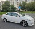 Білий Тойота Королла, об'ємом двигуна 1.4 л та пробігом 130 тис. км за 9201 $, фото 1 на Automoto.ua