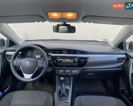 Белый Тойота Королла, объемом двигателя 1.33 л и пробегом 147 тыс. км за 11800 $, фото 4 на Automoto.ua