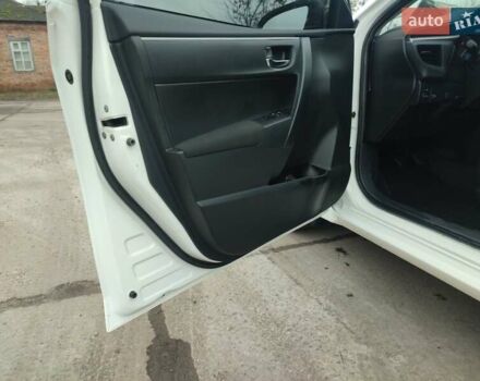 Белый Тойота Королла, объемом двигателя 1.3 л и пробегом 150 тыс. км за 10500 $, фото 14 на Automoto.ua