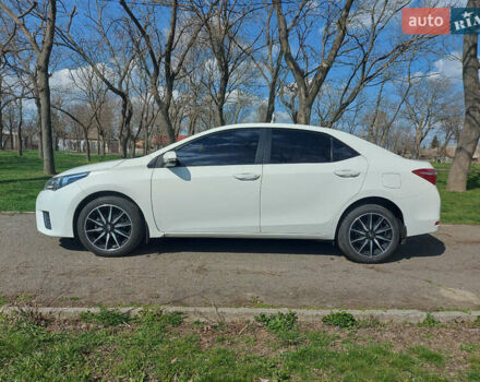 Белый Тойота Королла, объемом двигателя 1.3 л и пробегом 83 тыс. км за 12000 $, фото 3 на Automoto.ua