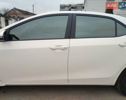 Белый Тойота Королла, объемом двигателя 1.3 л и пробегом 150 тыс. км за 10500 $, фото 1 на Automoto.ua