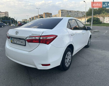 Білий Тойота Королла, об'ємом двигуна 1.33 л та пробігом 101 тис. км за 9999 $, фото 3 на Automoto.ua