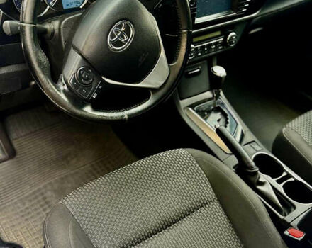 Білий Тойота Королла, об'ємом двигуна 1.6 л та пробігом 120 тис. км за 12500 $, фото 10 на Automoto.ua