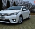 Білий Тойота Королла, об'ємом двигуна 1.6 л та пробігом 200 тис. км за 8499 $, фото 1 на Automoto.ua