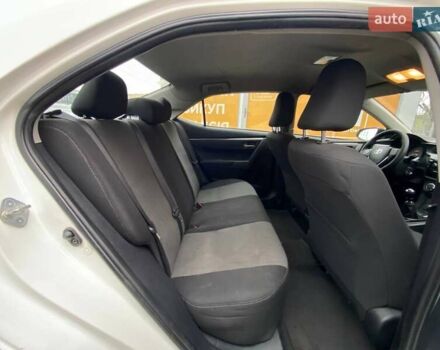 Білий Тойота Королла, об'ємом двигуна 1.33 л та пробігом 311 тис. км за 8500 $, фото 15 на Automoto.ua
