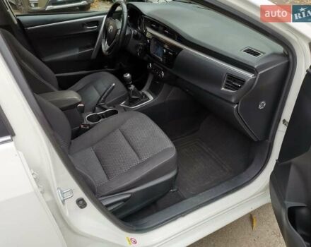 Білий Тойота Королла, об'ємом двигуна 1.6 л та пробігом 227 тис. км за 8900 $, фото 8 на Automoto.ua