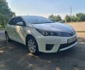 Білий Тойота Королла, об'ємом двигуна 1.3 л та пробігом 90 тис. км за 10700 $, фото 1 на Automoto.ua