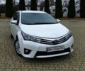 Білий Тойота Королла, об'ємом двигуна 1.6 л та пробігом 200 тис. км за 8699 $, фото 1 на Automoto.ua