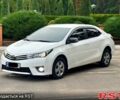 Белый Тойота Королла, объемом двигателя 1.3 л и пробегом 134 тыс. км за 10600 $, фото 1 на Automoto.ua