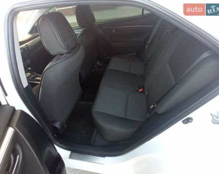 Белый Тойота Королла, объемом двигателя 1.6 л и пробегом 152 тыс. км за 13300 $, фото 13 на Automoto.ua