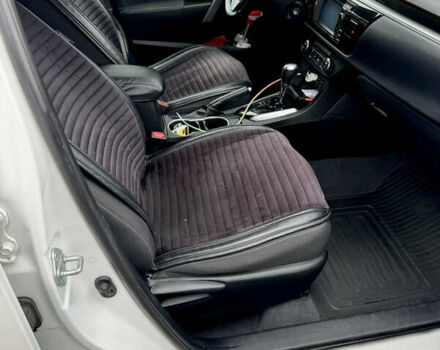 Білий Тойота Королла, об'ємом двигуна 1.6 л та пробігом 170 тис. км за 12700 $, фото 5 на Automoto.ua