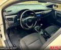 Белый Тойота Королла, объемом двигателя 1.3 л и пробегом 134 тыс. км за 10600 $, фото 4 на Automoto.ua