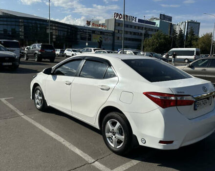 Белый Тойота Королла, объемом двигателя 1.33 л и пробегом 145 тыс. км за 10800 $, фото 4 на Automoto.ua