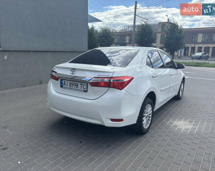 Белый Тойота Королла, объемом двигателя 1.6 л и пробегом 176 тыс. км за 10999 $, фото 7 на Automoto.ua