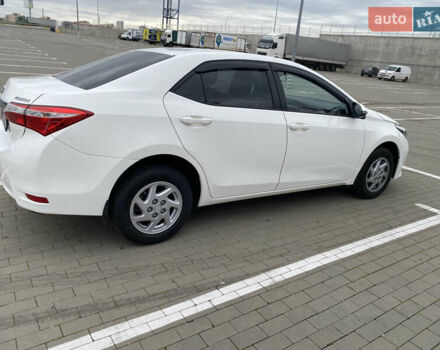 Білий Тойота Королла, об'ємом двигуна 1.6 л та пробігом 101 тис. км за 14000 $, фото 1 на Automoto.ua