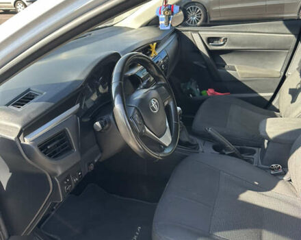 Белый Тойота Королла, объемом двигателя 1.33 л и пробегом 145 тыс. км за 10800 $, фото 18 на Automoto.ua