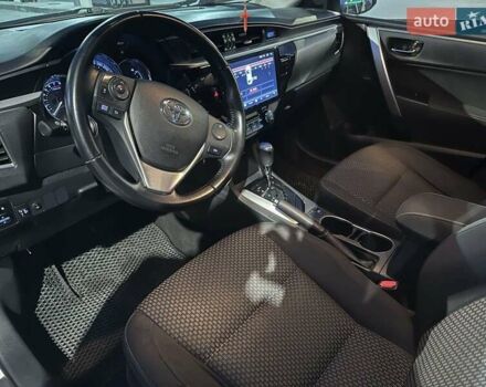 Білий Тойота Королла, об'ємом двигуна 1.6 л та пробігом 190 тис. км за 13200 $, фото 8 на Automoto.ua