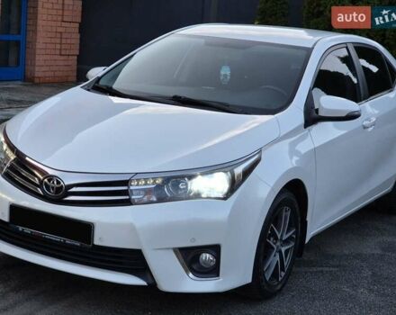 Білий Тойота Королла, об'ємом двигуна 1.6 л та пробігом 122 тис. км за 12000 $, фото 4 на Automoto.ua