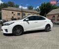 Белый Тойота Королла, объемом двигателя 1.6 л и пробегом 122 тыс. км за 13700 $, фото 1 на Automoto.ua