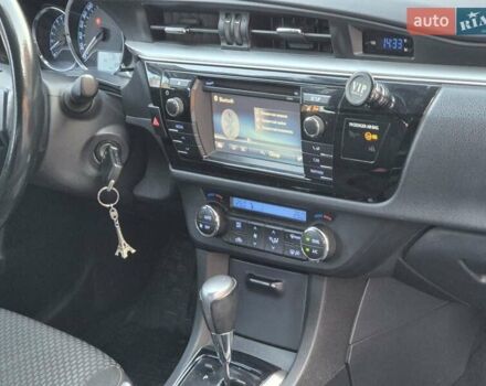 Білий Тойота Королла, об'ємом двигуна 1.6 л та пробігом 122 тис. км за 12000 $, фото 10 на Automoto.ua