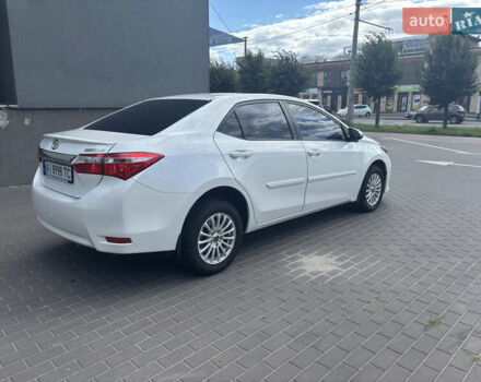 Белый Тойота Королла, объемом двигателя 1.6 л и пробегом 176 тыс. км за 10999 $, фото 5 на Automoto.ua