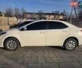 Белый Тойота Королла, объемом двигателя 1.3 л и пробегом 157 тыс. км за 8600 $, фото 2 на Automoto.ua
