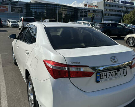 Белый Тойота Королла, объемом двигателя 1.33 л и пробегом 145 тыс. км за 10800 $, фото 1 на Automoto.ua