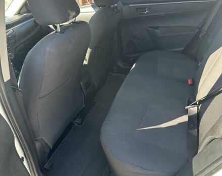 Белый Тойота Королла, объемом двигателя 1.33 л и пробегом 145 тыс. км за 10800 $, фото 19 на Automoto.ua