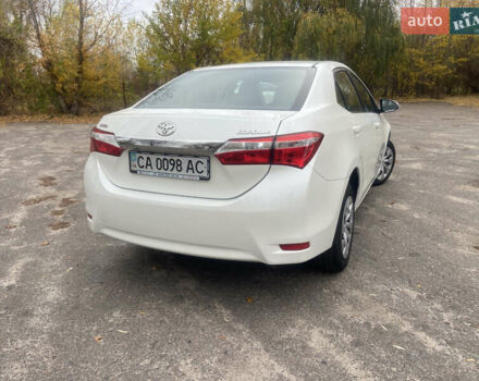 Белый Тойота Королла, объемом двигателя 1.6 л и пробегом 84 тыс. км за 13000 $, фото 4 на Automoto.ua