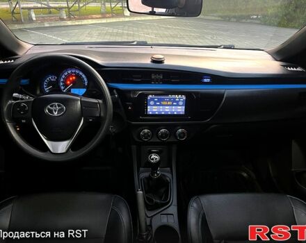 Белый Тойота Королла, объемом двигателя 1.6 л и пробегом 166 тыс. км за 10000 $, фото 4 на Automoto.ua